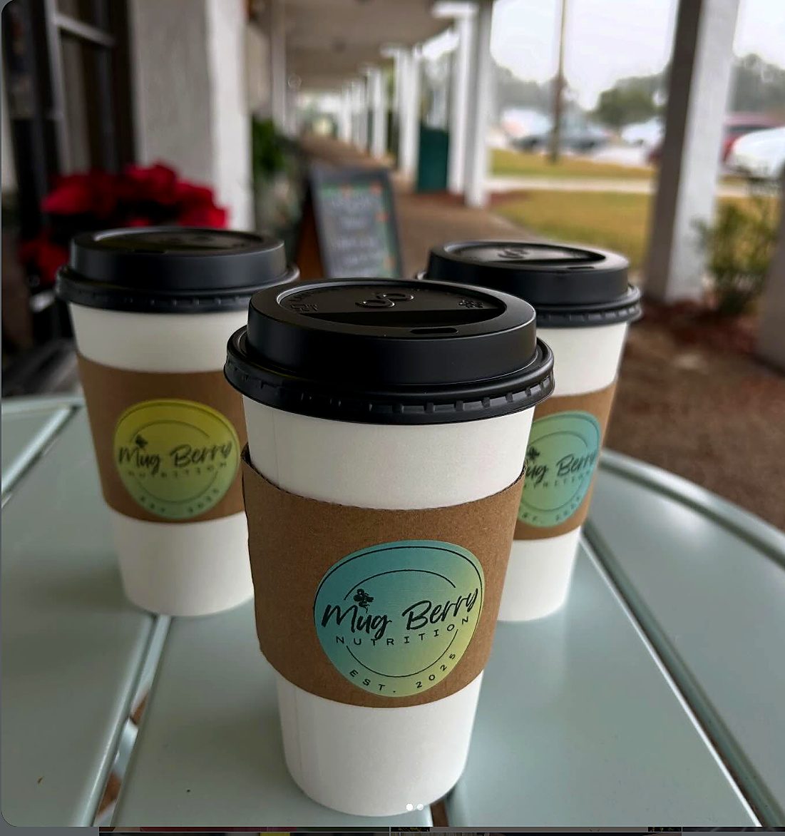 Three Mug Berry coffees on an outdoor table